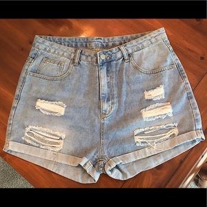 SHEIN Plus High waisted ripped denim shorts
